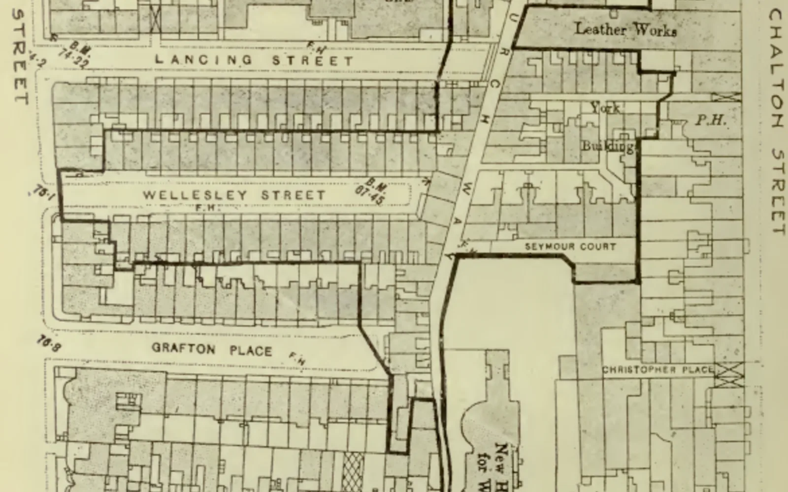 Historic photograph of working-class housing from the Housing for the Working Classes Committee Report, showing residential architecture from early 20th century